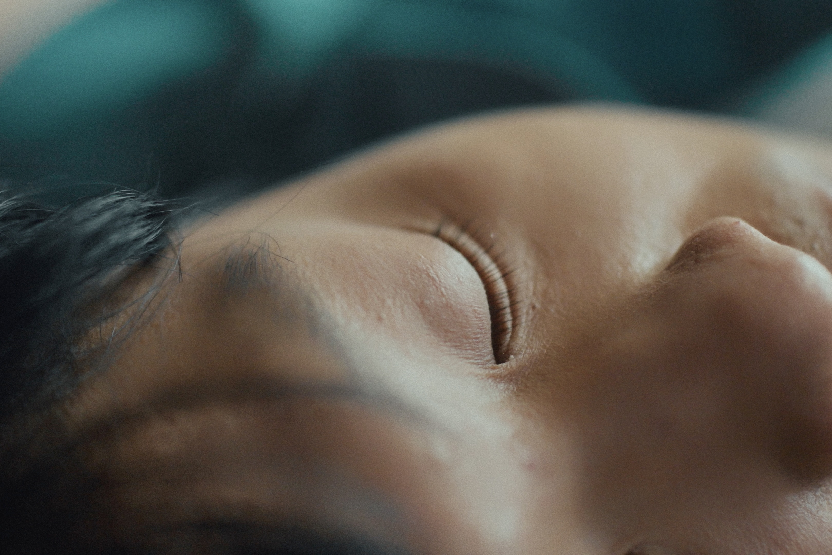 A close-up of a closed eye